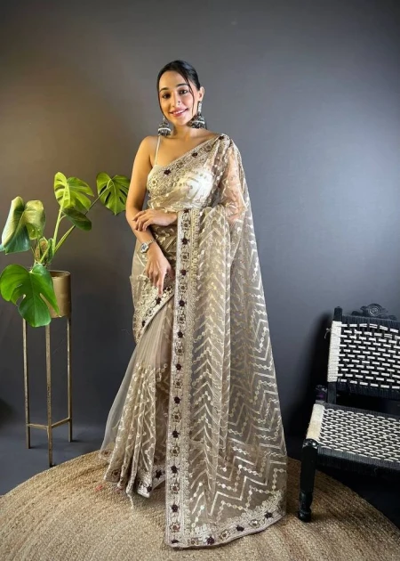 beige or light gold Net Embroidered Foil Print Stone And Thread Work Classic Saree For Ceremonial